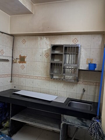 Kitchen in 1 BHK Apartment at Ashapura Heritage, Kandivali West – for Sale