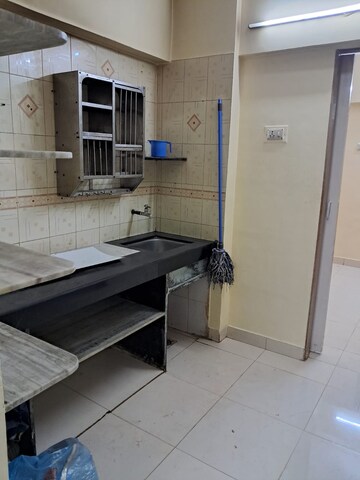 Kitchen in 1 BHK Apartment at Ashapura Heritage, Kandivali West – for Sale