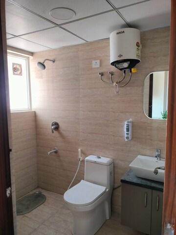 Bathroom in Studio Apartment at Okay Plus Solitaire Suites, Ramnagariya – for Rent