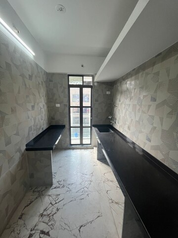 Kitchen in 1 BHK Apartment at Thanekar Palacio, Badlapur East – for Sale