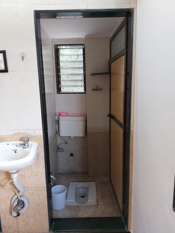 Bathroom in 1 BHK Apartment at Yashodhara CHS, Goregaon East – for Sale