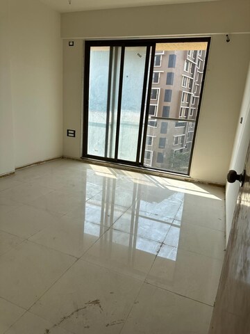 Room in 2 BHK Apartment at New Ambivali, Andheri West – for Sale