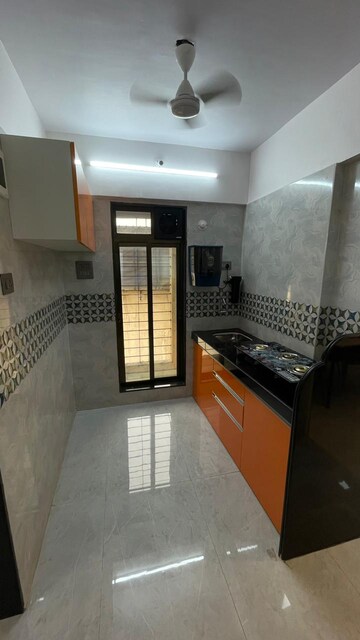 Kitchen in 1 BHK Apartment at Shree Adeshwar Anand Heights, Nalasopara West – for Sale