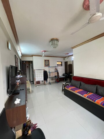 Living Room in 2 BHK Apartment at Borivali East – for Sale