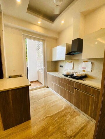 Kitchen in 3 BHK Builder Floor at Ansal API Esencia, Sector 67 – for Sale