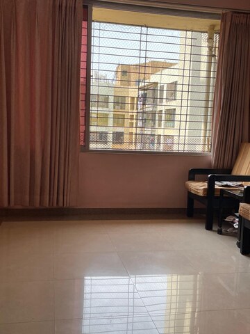 Living Room in 1 BHK Apartment at Vasant Sagar, Kandivali East – for Sale