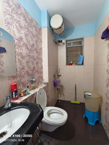 Bathroom in 2 BHK Apartment at Soham Garden, Manpada – for Sale