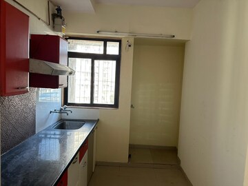 Kitchen in 1 BHK Apartment at Puranik Hometown, Ghodbunder Road – for Sale