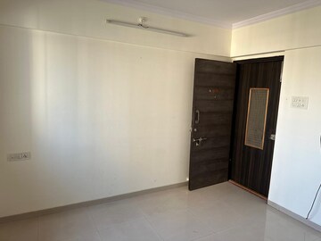 Living Room in 1 BHK Apartment at Puranik Hometown, Ghodbunder Road – for Sale