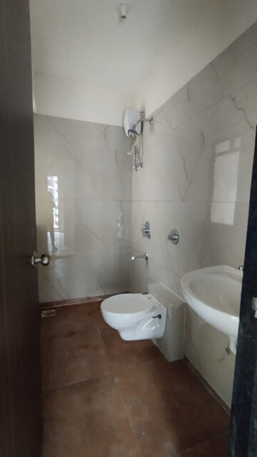 Bathroom in 1 BHK Apartment at Raunak City 3, Kalyan West – for Sale