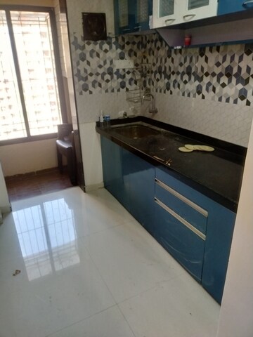 Kitchen in 2 BHK Apartment at Raunak City Sector 4, Kalyan West – for Sale