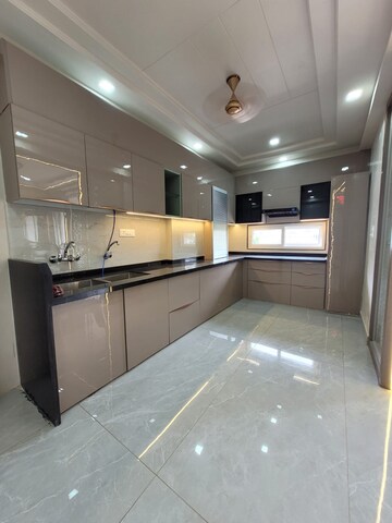 Kitchen in 4 BHK Apartment at Nirman Nagar – for Sale