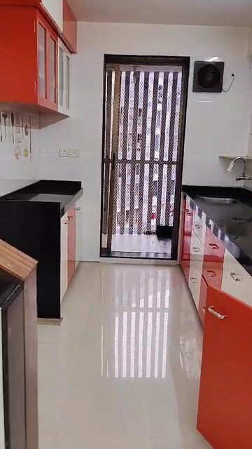 Kitchen in 2 BHK Apartment at Mandpeshwar Kripa CHS, Borivali East – for Sale