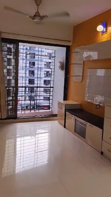 Kitchen in 2 BHK Apartment at Mandpeshwar Kripa CHS, Borivali East – for Sale