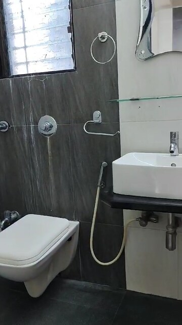 Bathroom in 2 BHK Apartment at Mandpeshwar Kripa CHS, Borivali East – for Sale