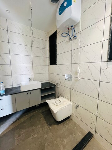 Bathroom in 4 BHK Builder Floor at Kohli One Malibu Town, Sector 47 – for Sale