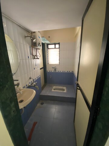 Bathroom in 2 BHK Apartment at Puranik City, Kasarvadavali – for Sale