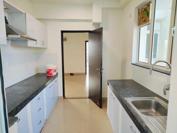 Kitchen in 2.5 BHK Apartment at M3M Woodshire, Sector 107 – for Sale