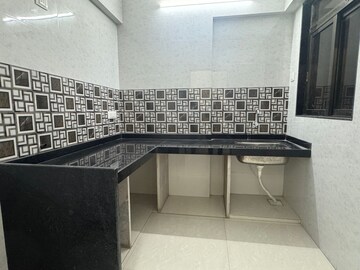 Kitchen in 2 BHK Apartment at Sai Balaji Govind, Thakurli – for Sale