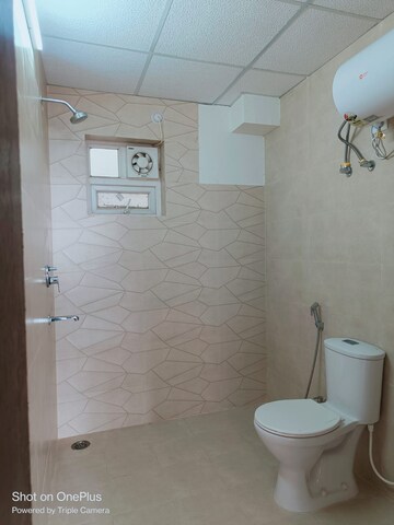 Bathroom in 2 BHK Apartment at Jankipuram – for Sale