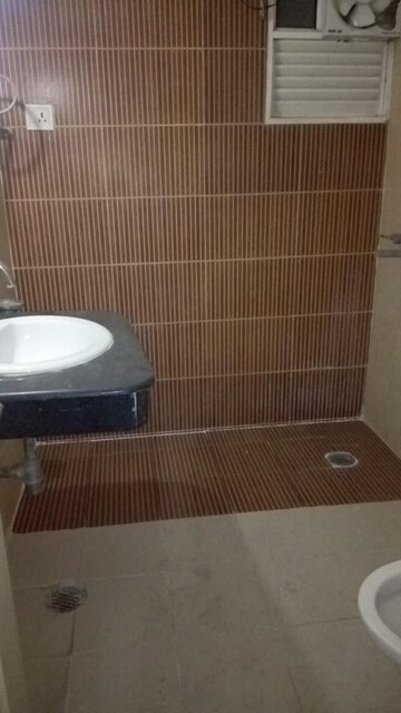 Bathroom in 3 BHK Apartment at Panchsheel Wellington, Sain Vihar – for Sale