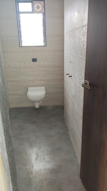 Bathroom in 2.5 BHK Apartment at Vile Parle East – for Sale
