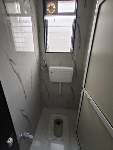 Bathroom in 2 BHK Apartment at Space Sapphire Heights, Naupada – for Sale