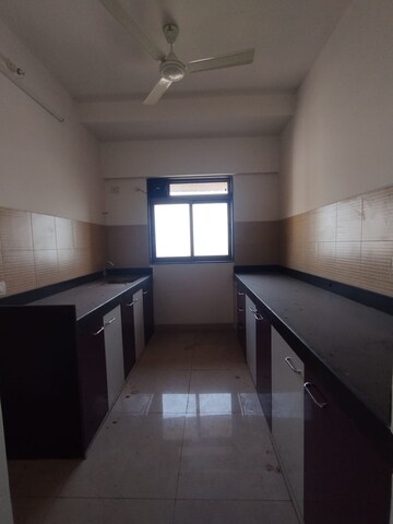 Kitchen in 3 BHK Apartment at Lodha Splendora, Ghodbunder Road – for Sale