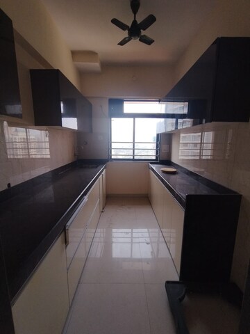 Kitchen in 3 BHK Apartment at Satguru Solitaire, Kasarvadavali – for Sale