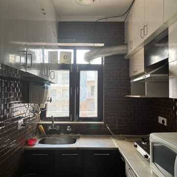 Kitchen in 2 BHK Builder Floor at Ansal Sushant Lok I, Sector 43 – for Rent