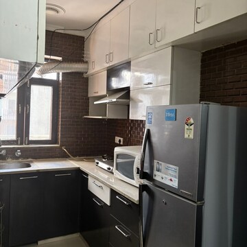 Kitchen in 2 BHK Builder Floor at Ansal Sushant Lok I, Sector 43 – for Rent