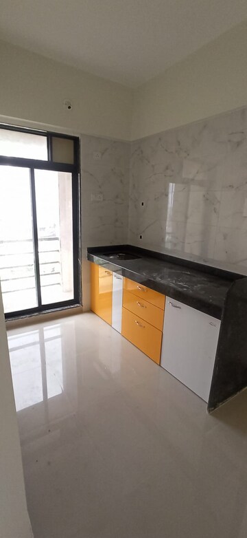 Kitchen in 1 BHK Apartment at Platinum Casita Enclave, Naigaon East – for Rent