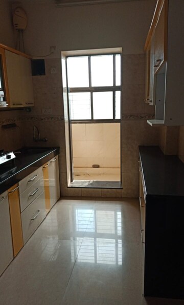 Kitchen in 2 BHK Apartment at Goyal Lakshchandi Heights, Goregaon East – for Sale