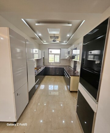 Kitchen in 3.5 BHK Builder Floor at Carnation Greens, Sector 8 – for Sale