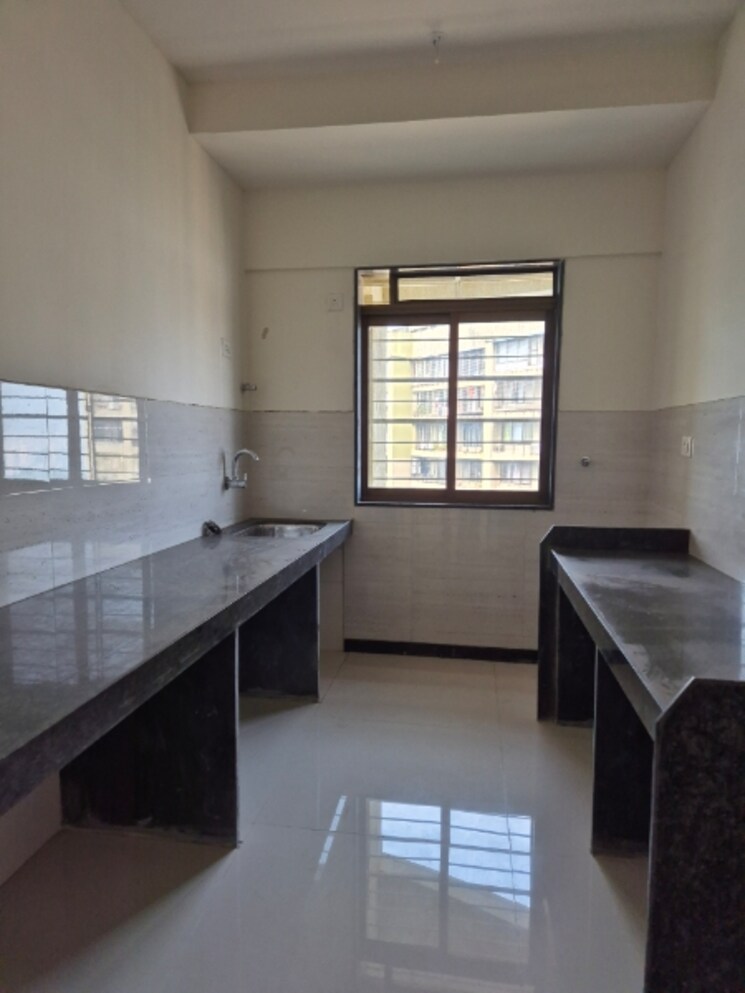 Kitchen, acme-ozone-phase-ii 2 Bedroom 676 Sq.Ft. Apartment In Ghodbunder Road Thane 7752514