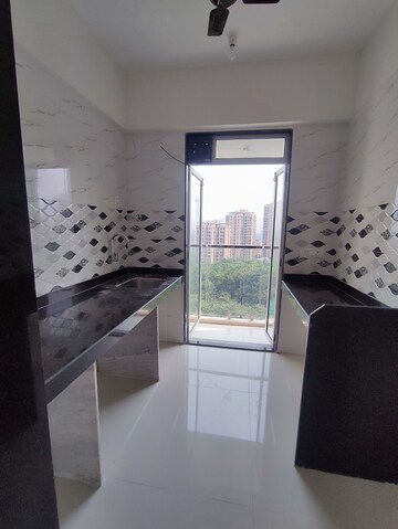 Kitchen in 1 BHK Apartment at JVM Veda, Kasarvadavali – for Sale