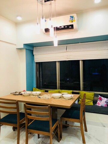 Living Room in 2 BHK Apartment at Charni Road – for Sale