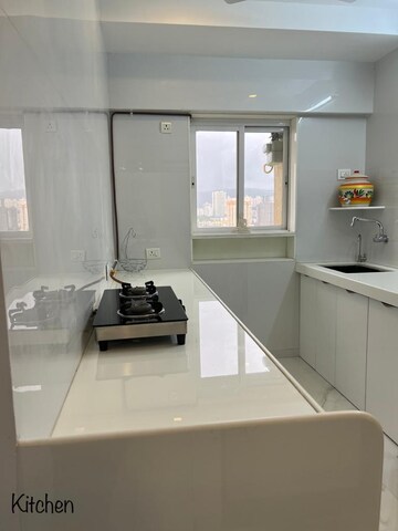 Kitchen in 3 BHK Apartment at T Bhimjyani Neelkanth Woods, Manpada – for Sale