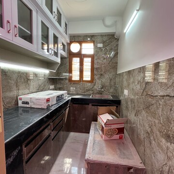 Kitchen in 1.5 BHK Builder Floor at Ansal Sushant Lok I, Sector 43 – for Rent