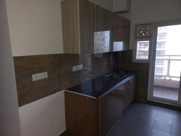 Kitchen in 4 BHK Apartment at Elite Golf Green, Sector 79 – for Sale