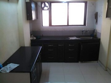 Kitchen in 2 BHK Apartment at Green Fields Society, Pimpri – for Sale