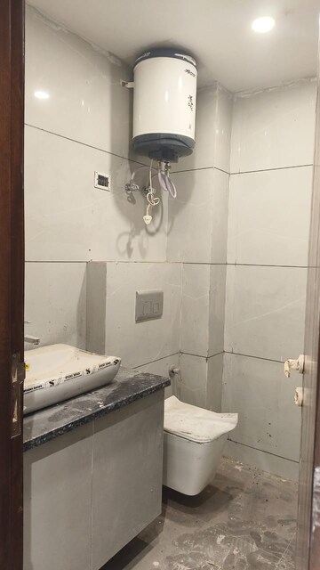 Bathroom in 3 BHK Builder Floor at Paryavaran Complex – for Sale