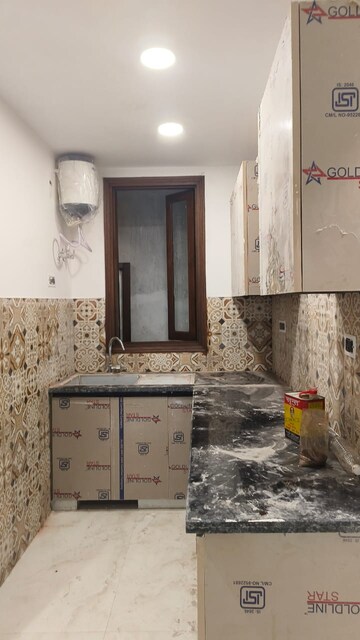 Kitchen in 3 BHK Builder Floor at Paryavaran Complex – for Sale