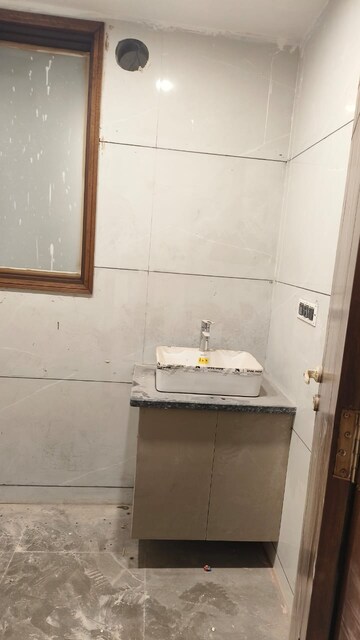 Bathroom in 3 BHK Builder Floor at Paryavaran Complex – for Sale