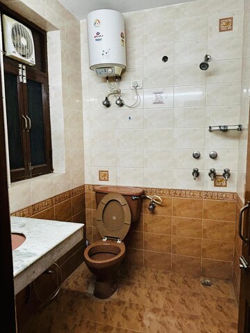 Bathroom in 2 BHK Independent House at Dharam Flats, Palam Vihar Extension – for Sale