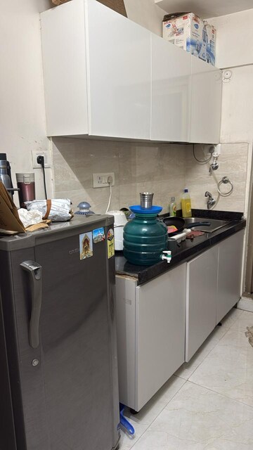Kitchen in 1 BHK Apartment at MJ Shah Centrio, Govandi – for Sale