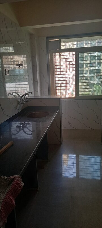 Kitchen in 1 BHK Apartment at Mohan Suburbia, Ambernath West – for Sale