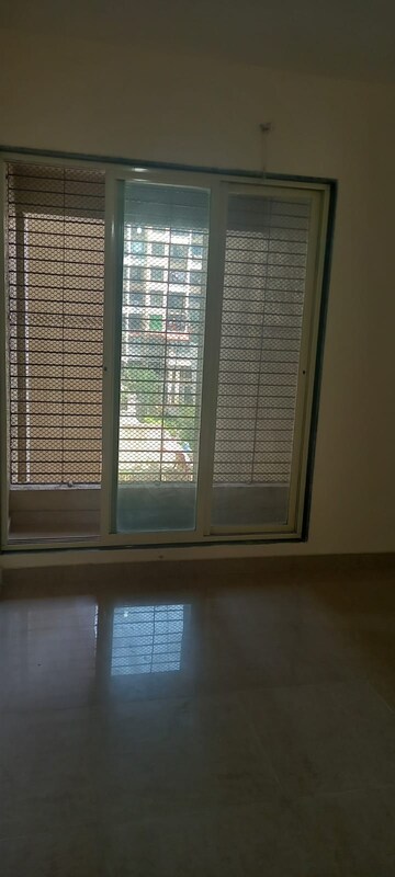 Room in 1 BHK Apartment at Mohan Suburbia, Ambernath West – for Sale