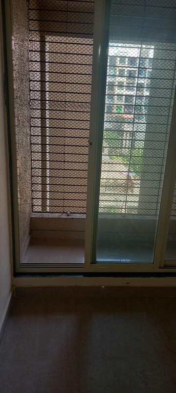 Room in 1 BHK Apartment at Mohan Suburbia, Ambernath West – for Sale