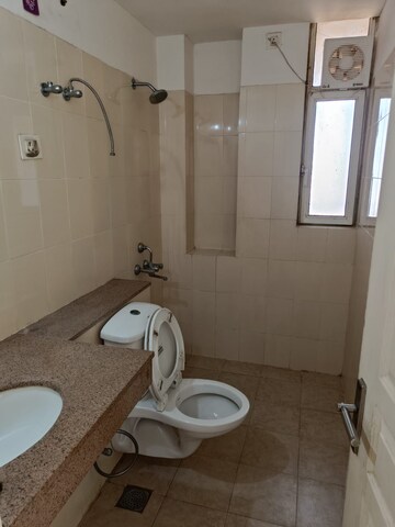 Bathroom in 3 BHK Apartment at Cosmos Express 99, Sector 99 – for Sale